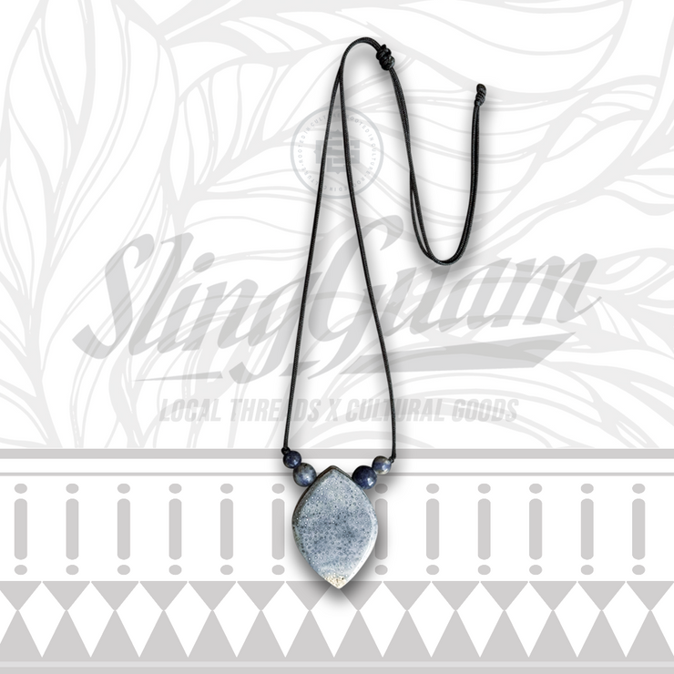 FOSSILIZED BLUE CORAL SLING STONE